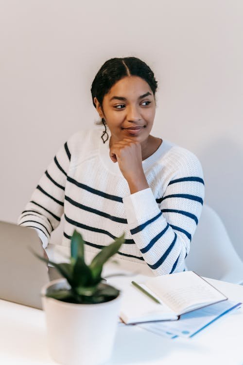 women in white tshirt in third eye solutions office